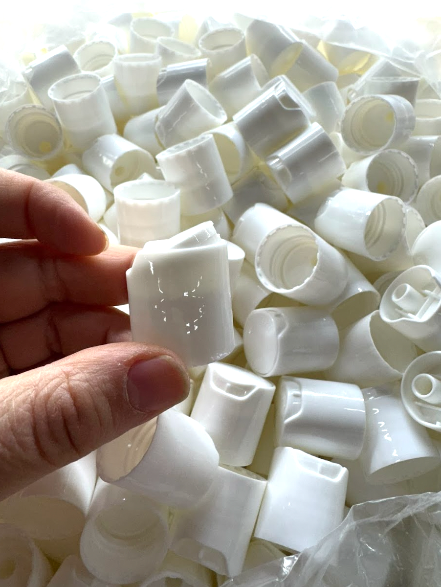 Press top caps for our 4 and 16 oz fragrance bottles